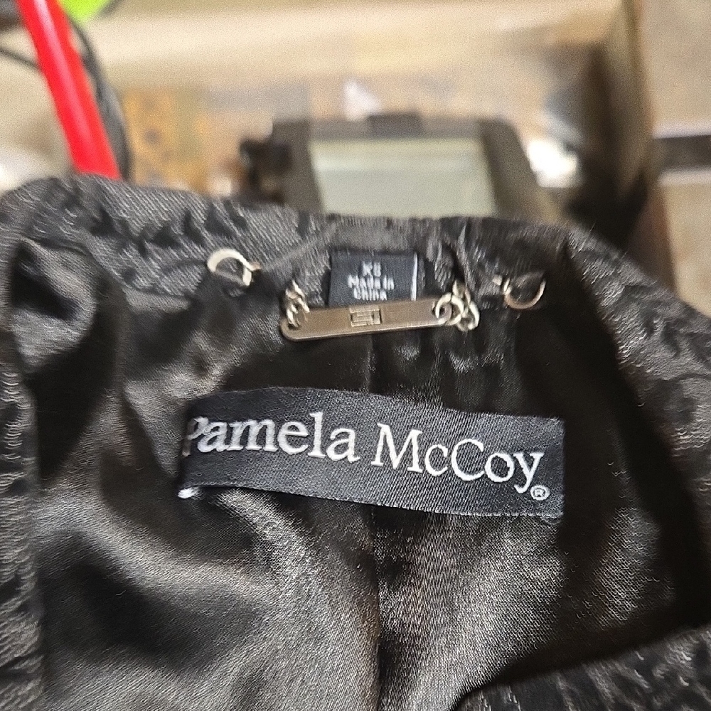 Pamela McCoy Sleek Black Outerwear